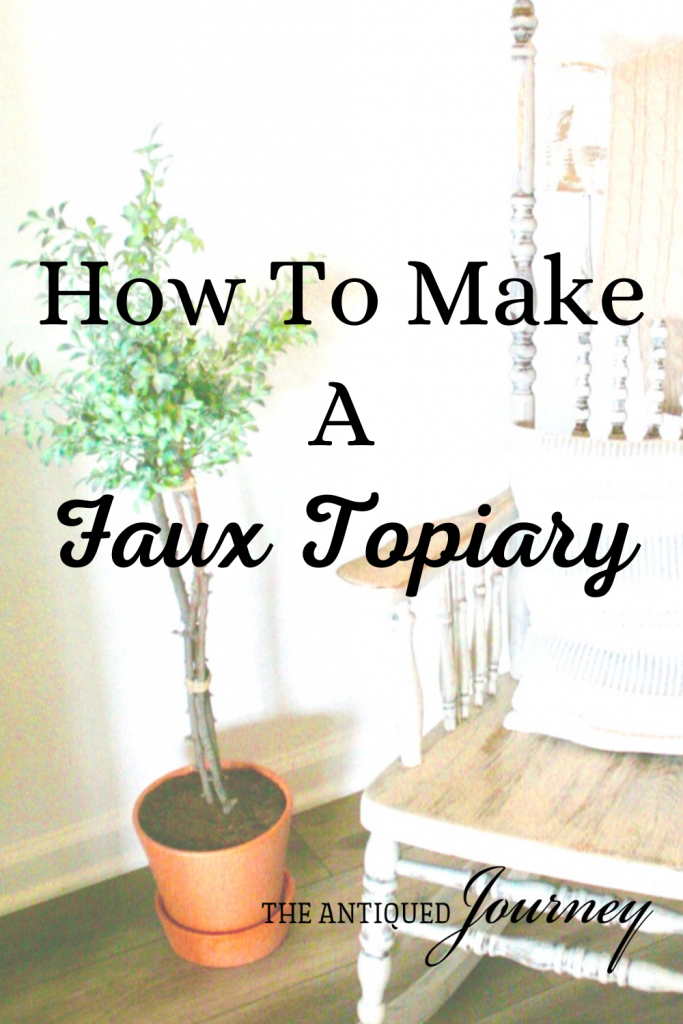 a DIY faux topiary next to a rocking chair