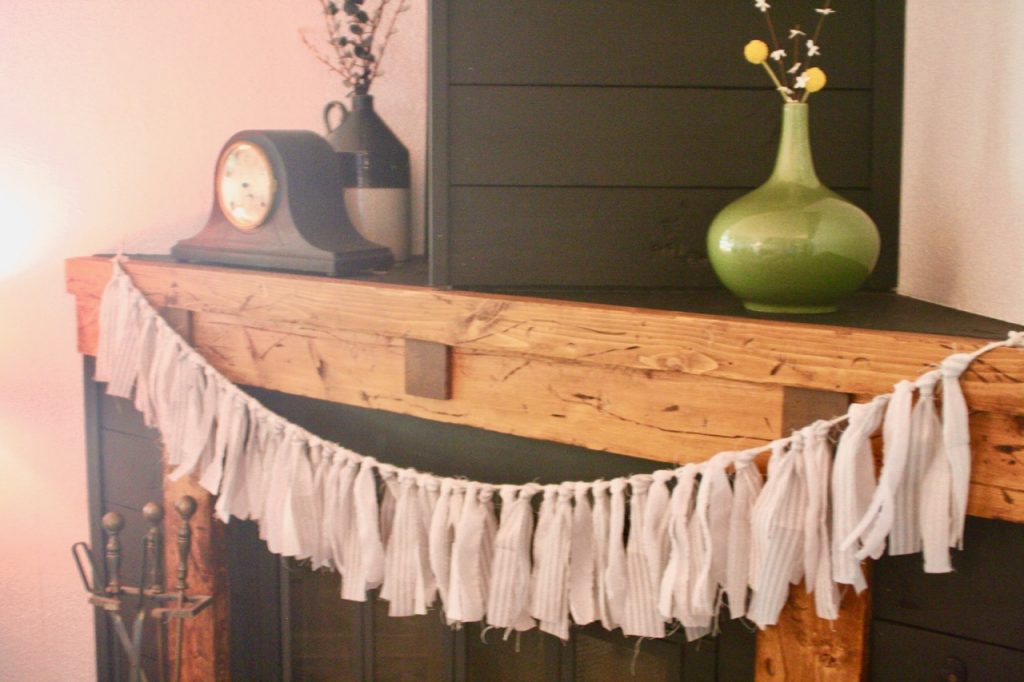 ticking strip fabric garland draped across a mantel