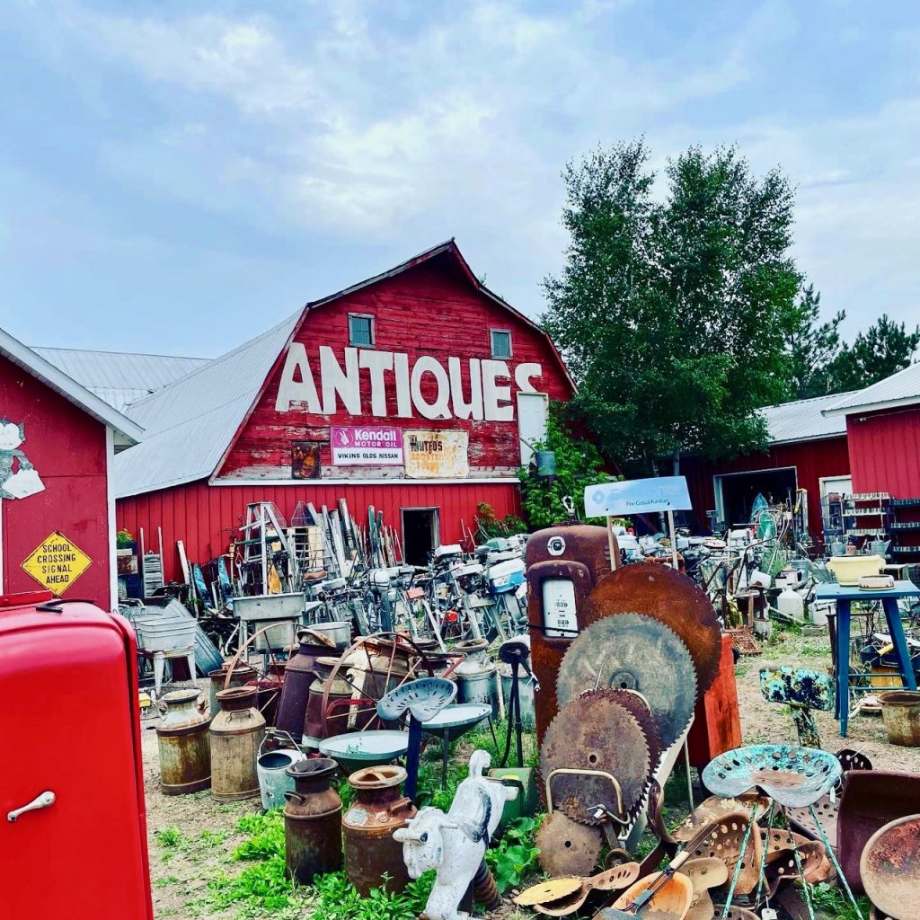 a red barn full of antiques