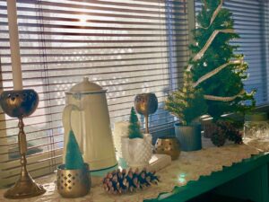 a winter vintage vignette with brass and milk glass