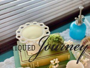 DIY faux moss ball displayed in a vignette