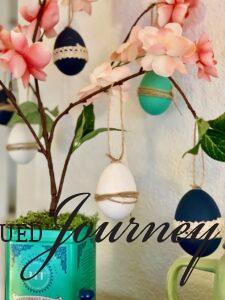 DIY Easter tree with a vintage tin base and homemade egg ornaments