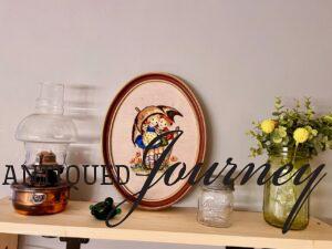 a shelf decorated with vintage decor