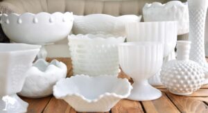 a collection of vintage milk glass