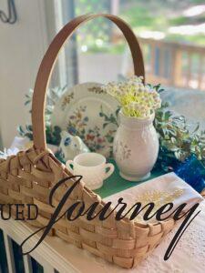 a thrifted basket used for a summer vignette