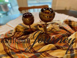 vintage, thrifted brass candle holders used in a fall centerpiece