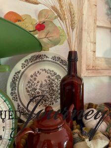 a vintage vignette with transferware and decorative wheat