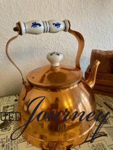 a vintage copper teapot