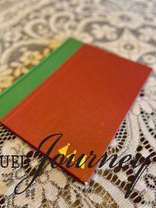a vintage red and green book for a centerpiece