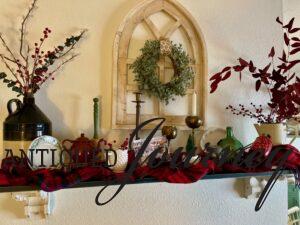 a shelf decorated for Christmas with vintage items
