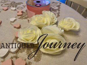 faux cream colored roses for a Valentines table