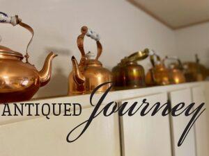 vintage copper teapots styled in a kitchen