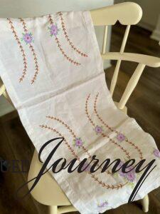 a vintage linen with purple flowers 