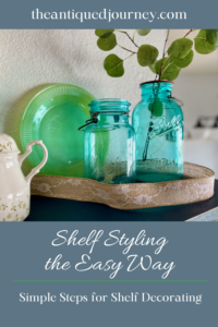 a wall shelf decorated with vintage decor for an early Spring shelf styling