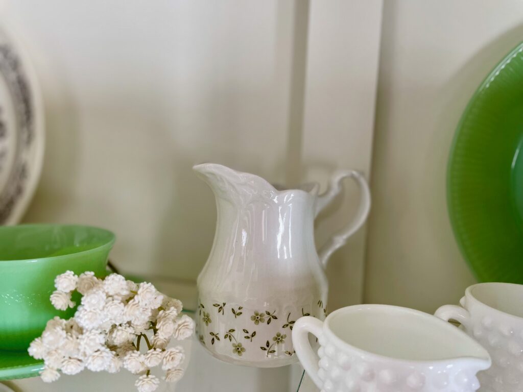 vintage Spring decor styled in a hutch