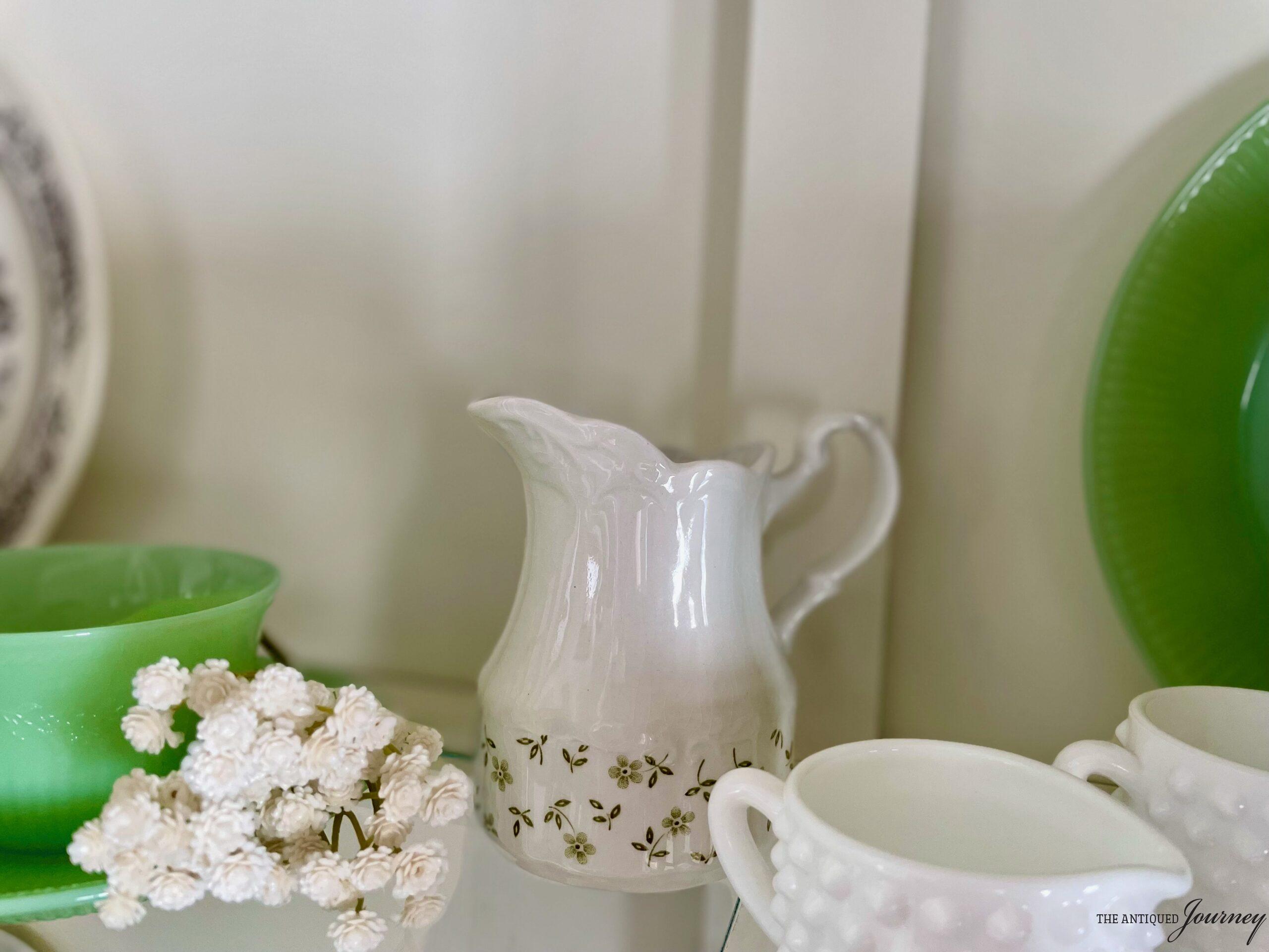 vintage Spring decor styled in a hutch