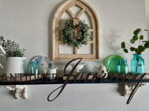 a styled Spring shelf with vintage decor