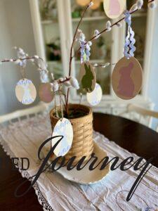 a DIY Easter tree sitting on an Ironstone platter
