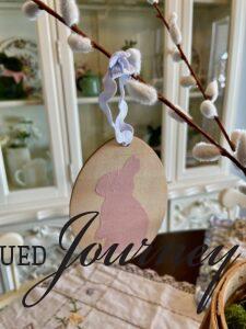 a DIY pink bunny ornament on an Easter tree