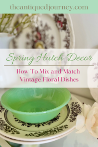 vintage dishes used in a Spring hutch display