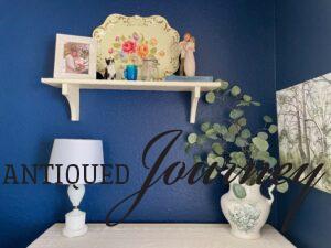 vintage Spring decor on a bedroom shelf