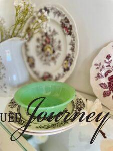 vintage dishes used in white hutch for Spring