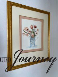 thrifted poppy flower art in a frame