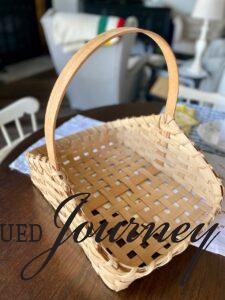 an empty thrifted basket on a table