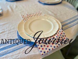 add a white salad plate for a 4th of July table setting
