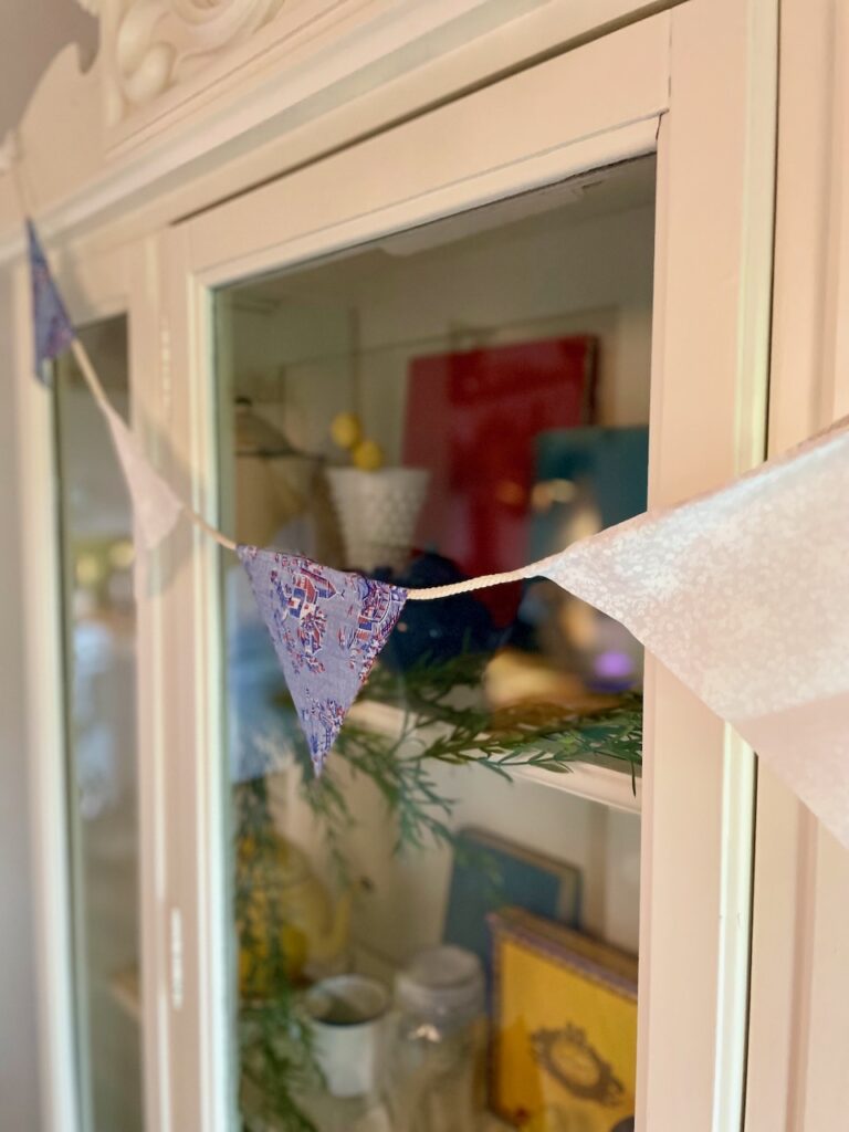 a patriotic bunting banner DIY on a hutch