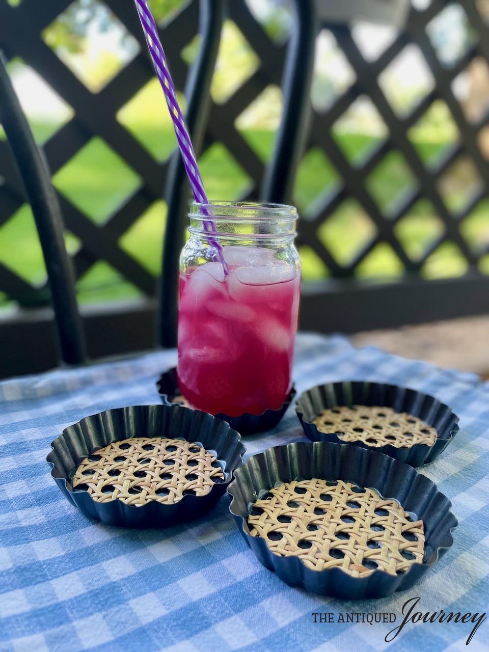 DIY mini tart pan coasters with cane on a patio