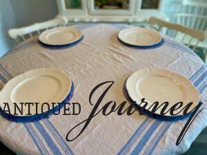 thrifted white dishes for a patriotic table