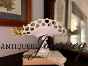 a vintage milk glass banana stand styled on a mantel for Summer
