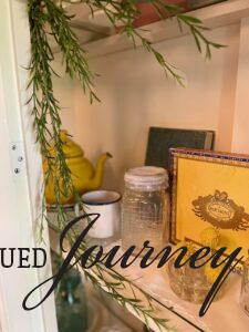 vintage Summer decor in a hutch