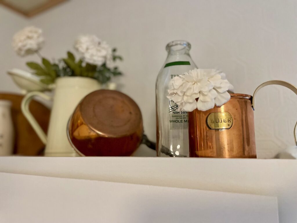 vintage kitchen decor above cabinets