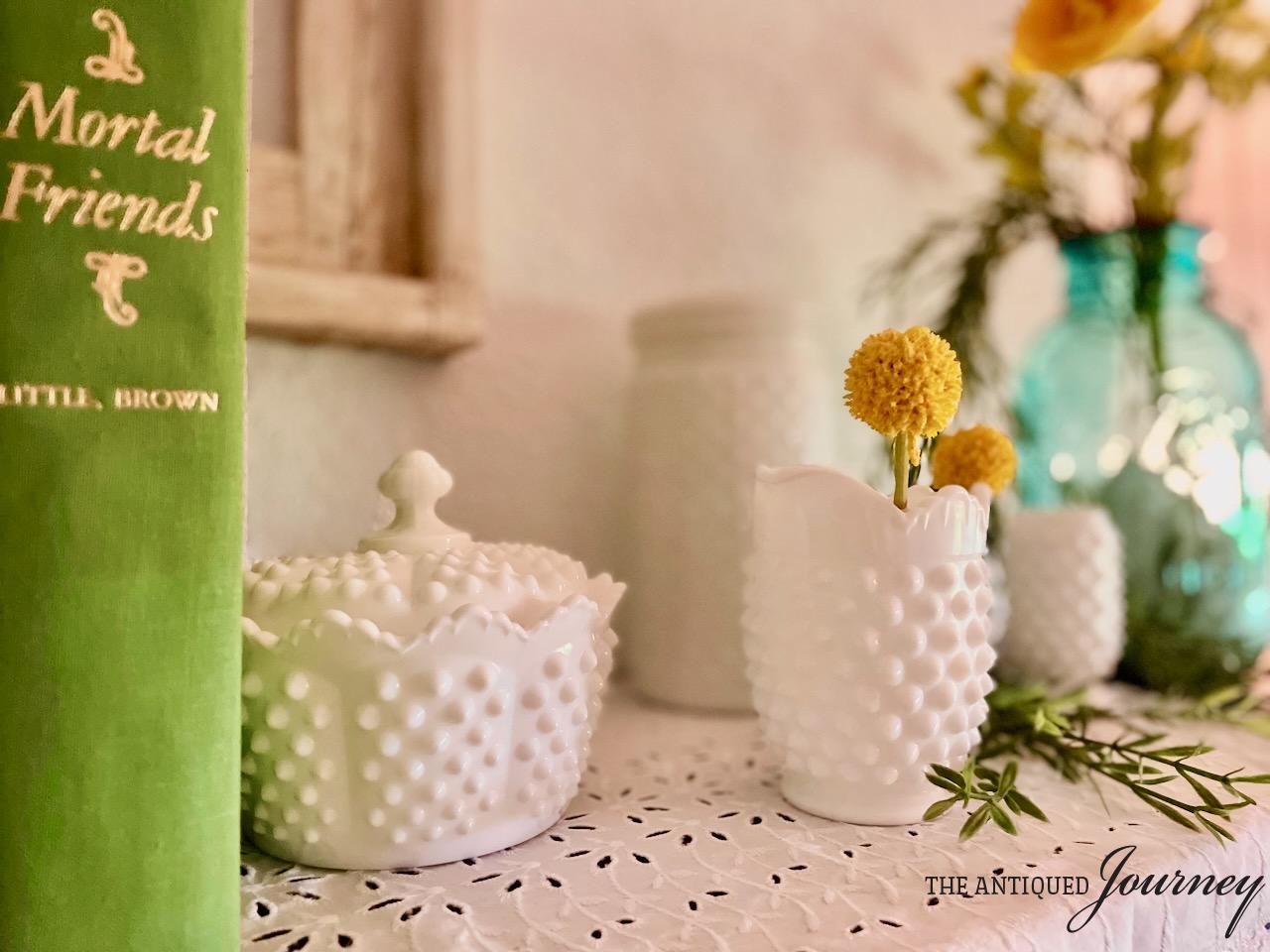 vintage hobnail milk glass with yellow flowers