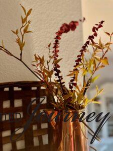 Fall faux stems in a vintage copper kettle
