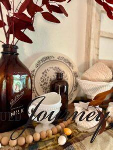 vintage milk glass and amber glass bottles used for Fall decorating