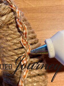 glue braids down to rope wreath form