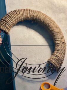 jute rope wrapped halfway around a wire wreath form