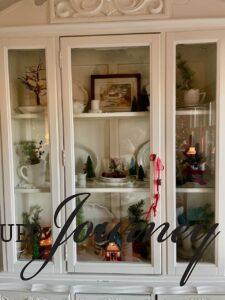 decorating a hutch for Christmas