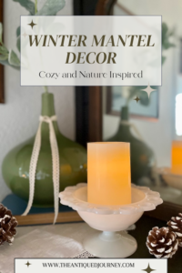 Winter mantel decor with milk glass and pinecones