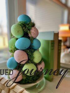 a DIY easter egg topiary with pastel colors