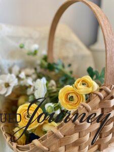 artificial flowers in a basket 