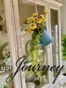 DIY Spring wreath using a watering can